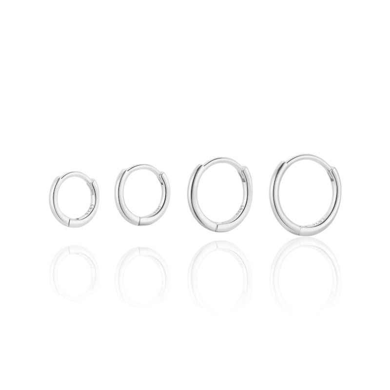 Gefüllte teeny Creolen • 925 Sterling Silber • 1,3 mm DickeVielringVielringGefüllte teeny Creolen • 925 Sterling Silber • 1,3 mm Dicke